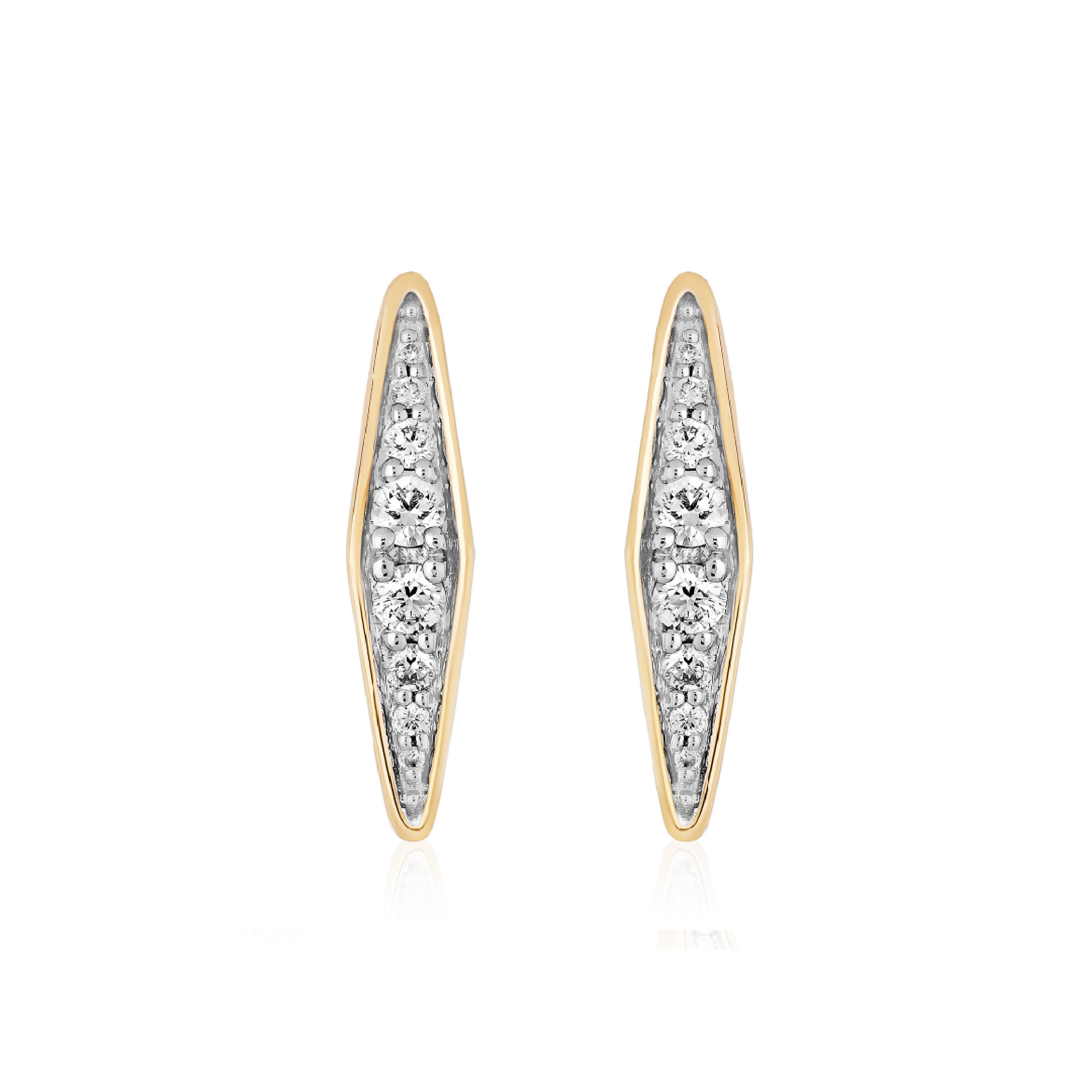 Close-up of 14K solid gold diamond earrings on a woman's ear, showcasing elegant design.