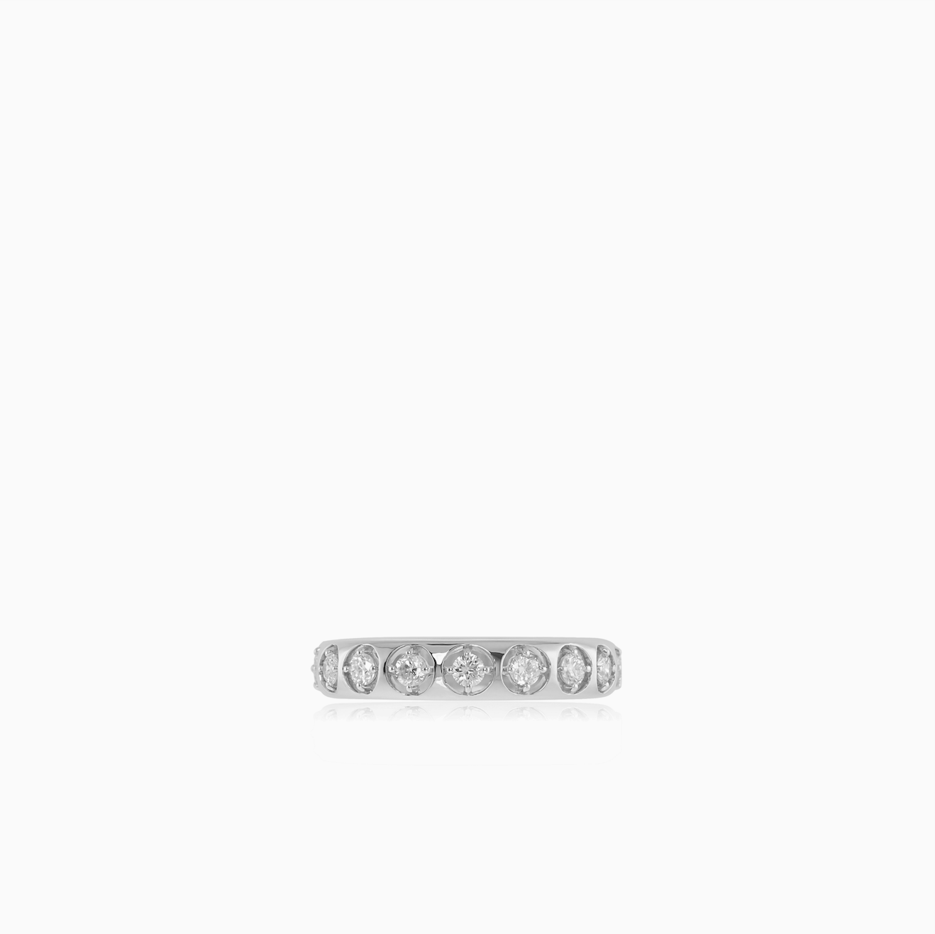 14K solid gold ring with round diamonds in a stackable design.