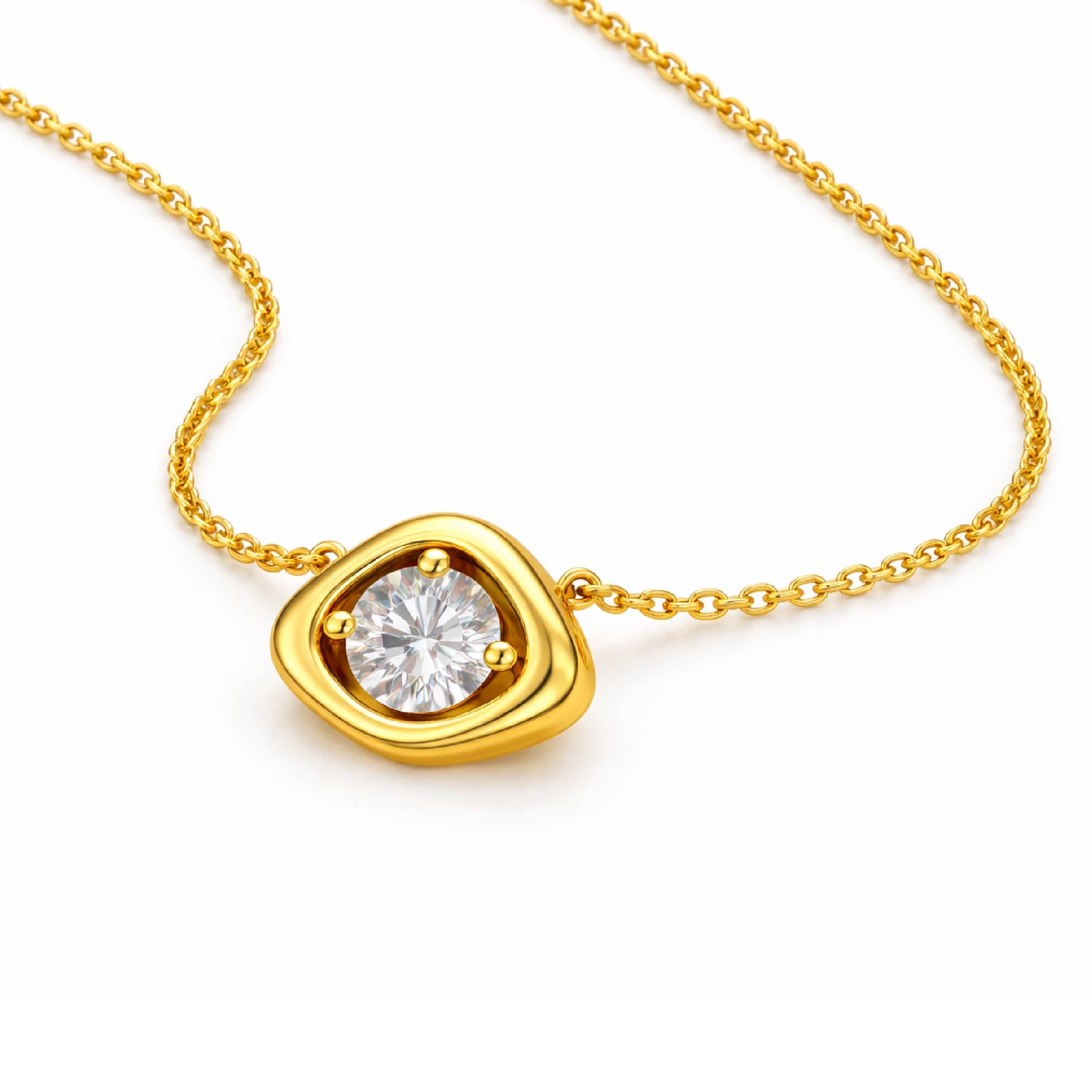 Gold necklace with a diamond pendant on a white background