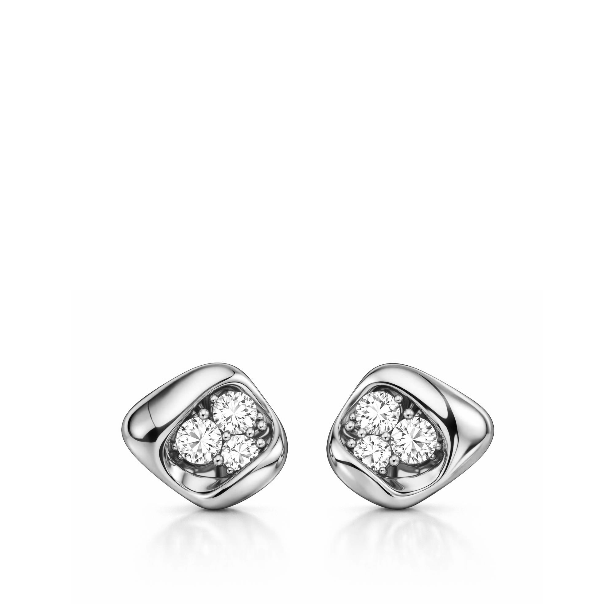 Silver earrings with clear gemstones on a white background