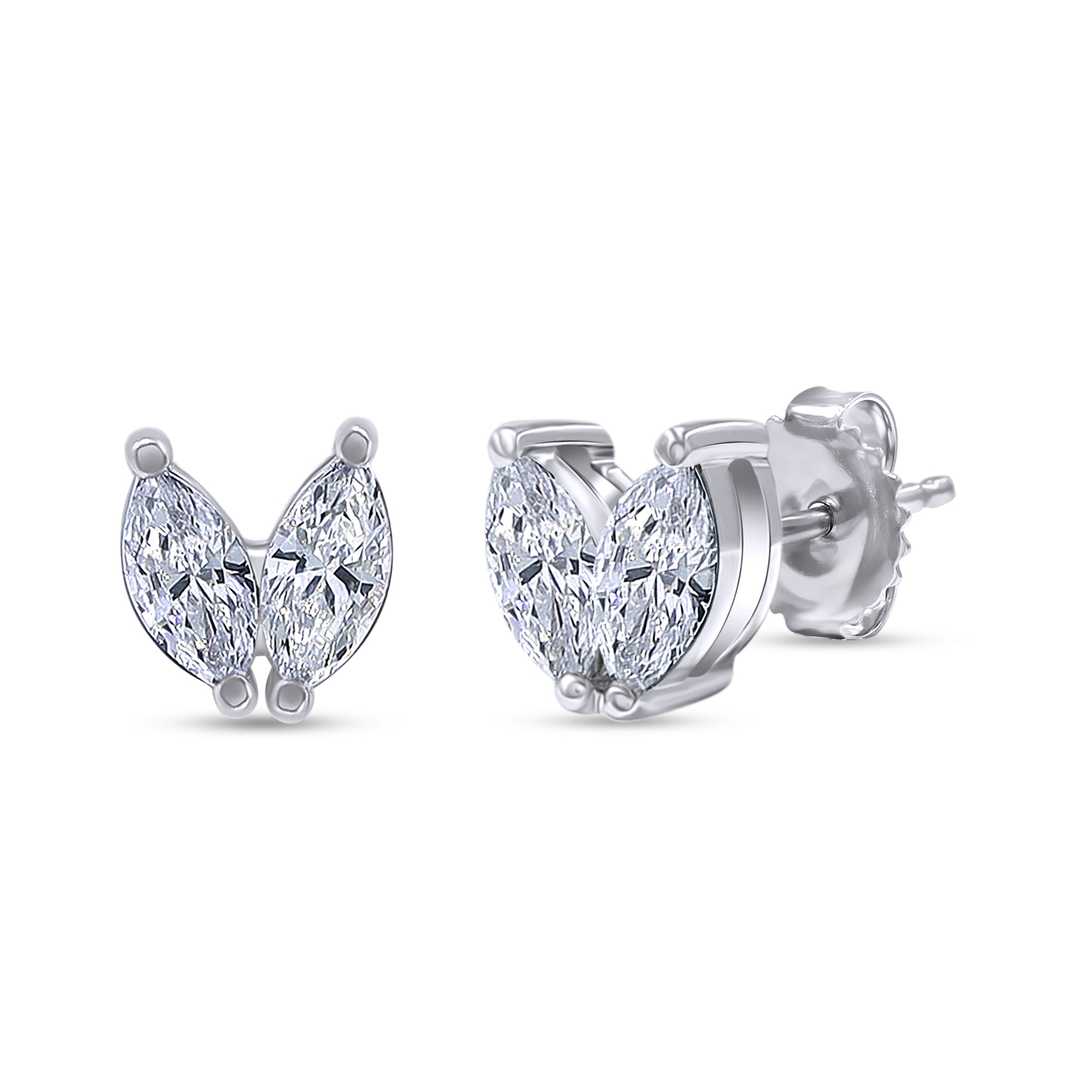 Heart-shaped diamond earrings on a white background