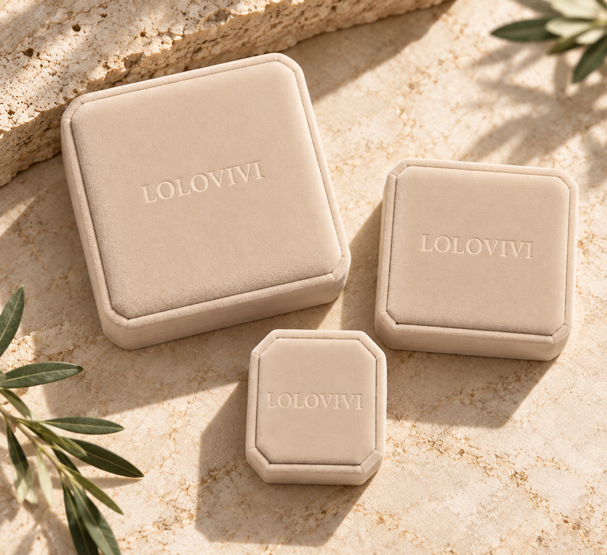 The Beige Jewelry boxes with the Lolovivi Logo branded on the top of the box