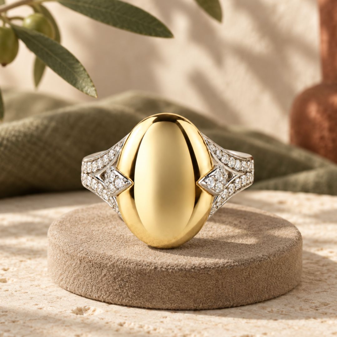The Bean ring in mixed metals with gold vermeil and lab diamonds on a jewelry rider