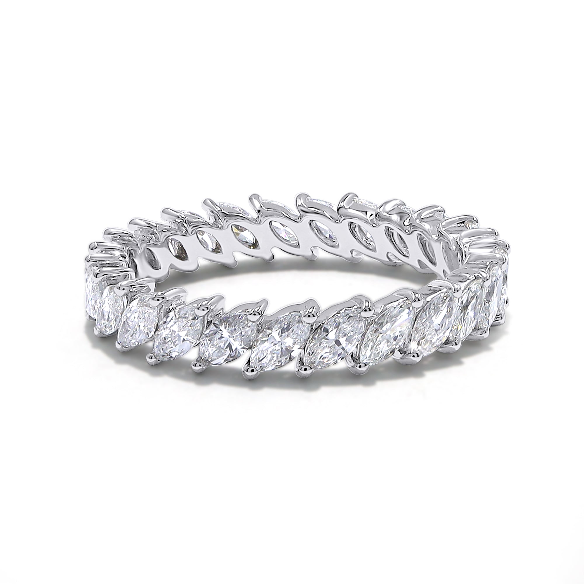 Diamond ring with marquise-shaped stones on a white background