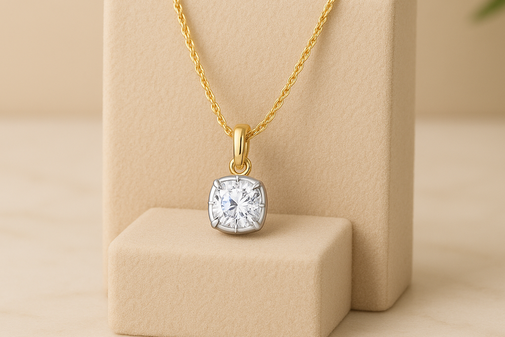 Gold necklace with a diamond pendant on a beige stand