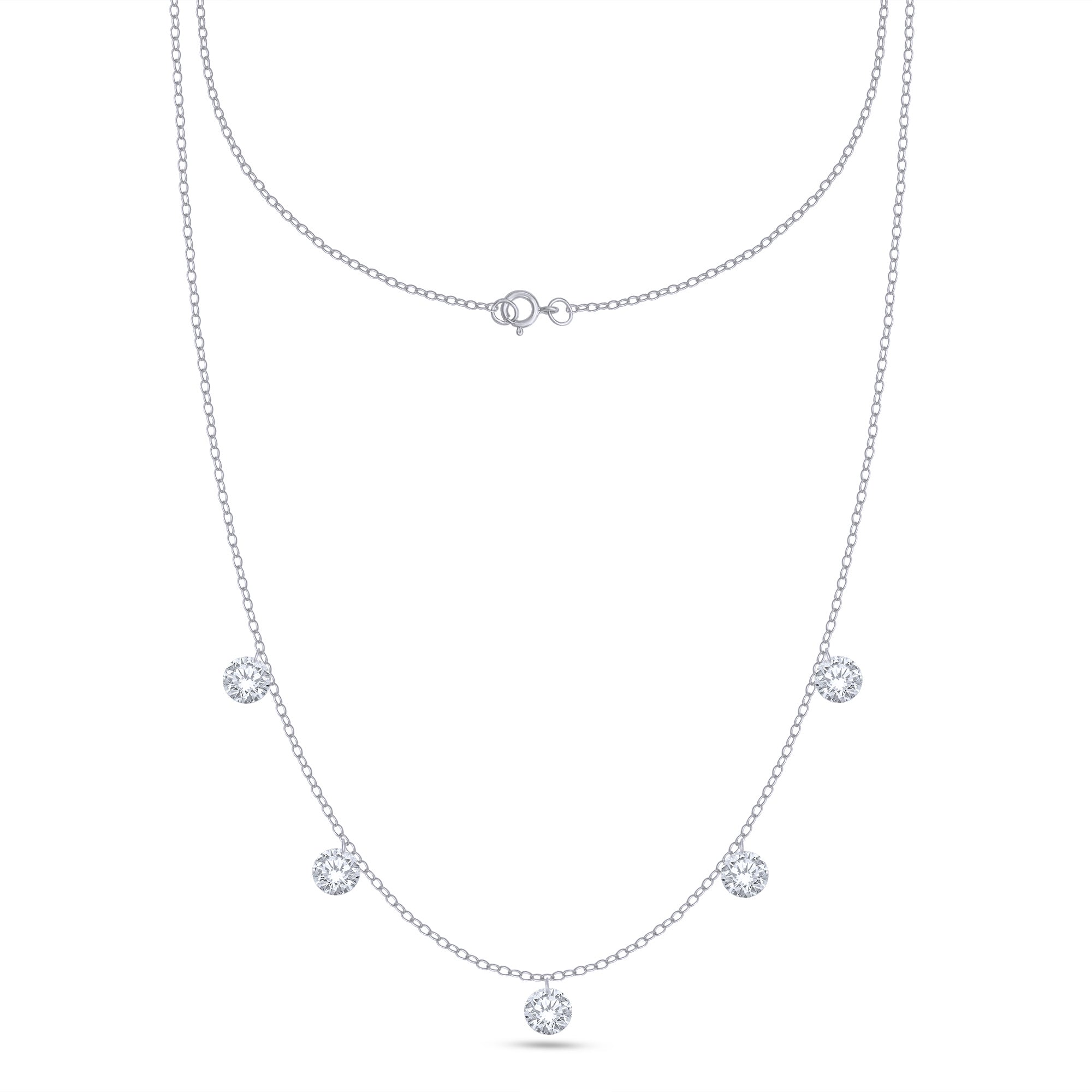 Delicate silver necklace with small round pendants on a white background