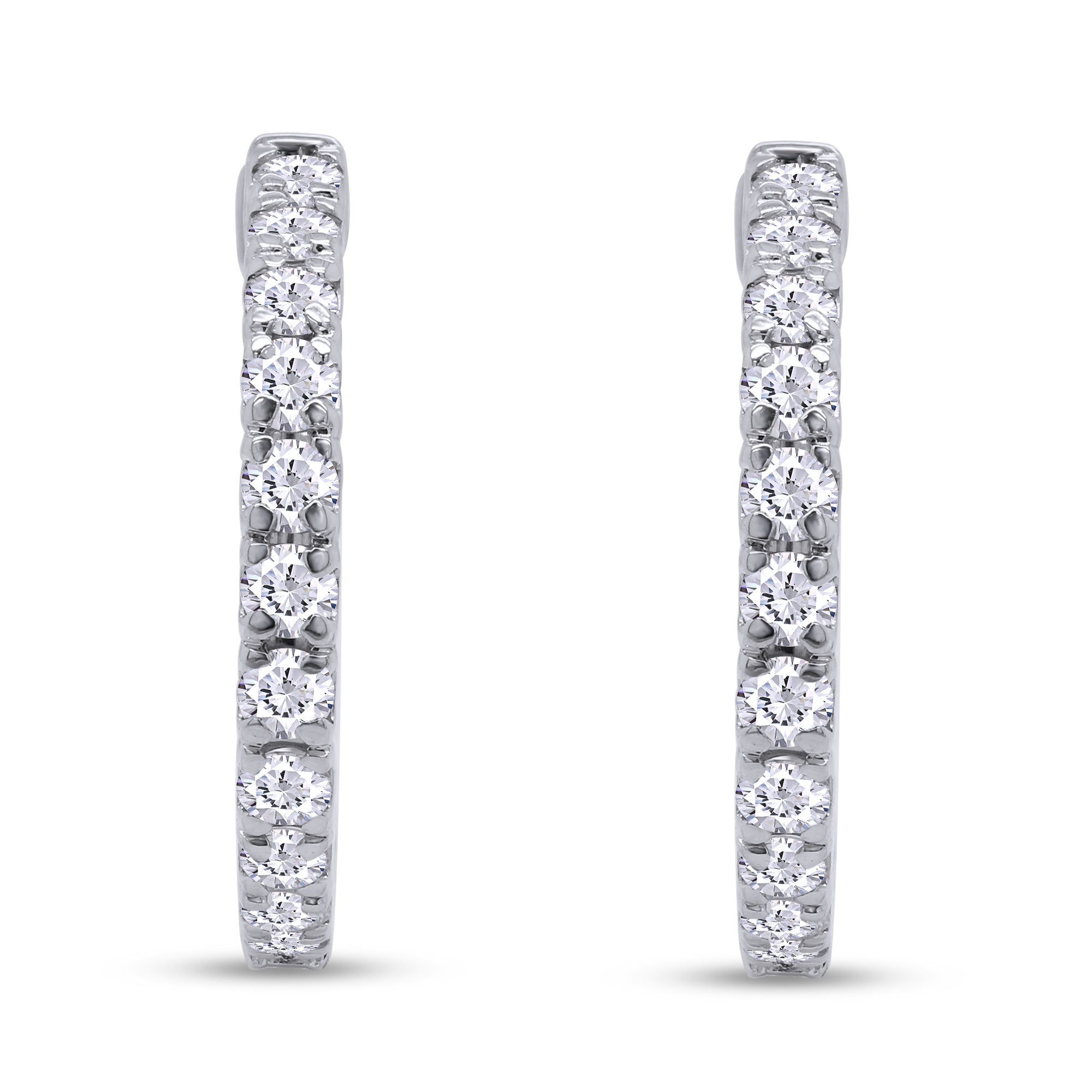 Pair of diamond hoop earrings on a white background
