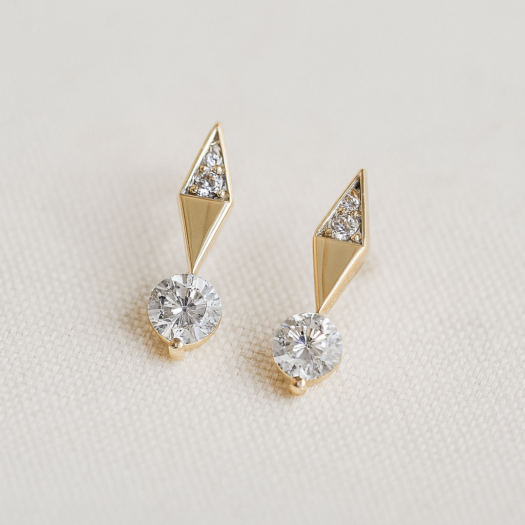 Diamond Stud Drop Earrings on beige counter