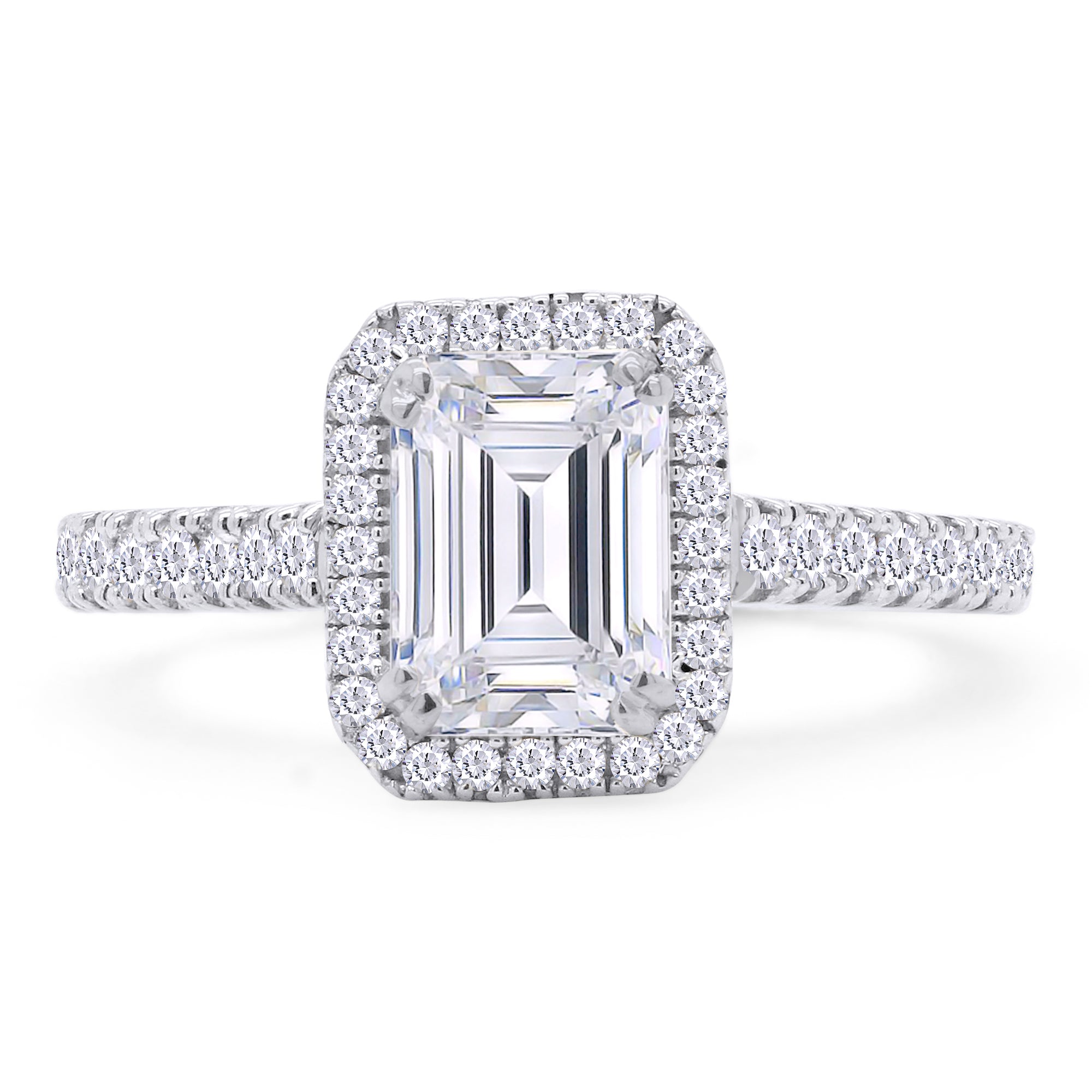 Diamond ring with emerald-cut center stone and halo on a white background