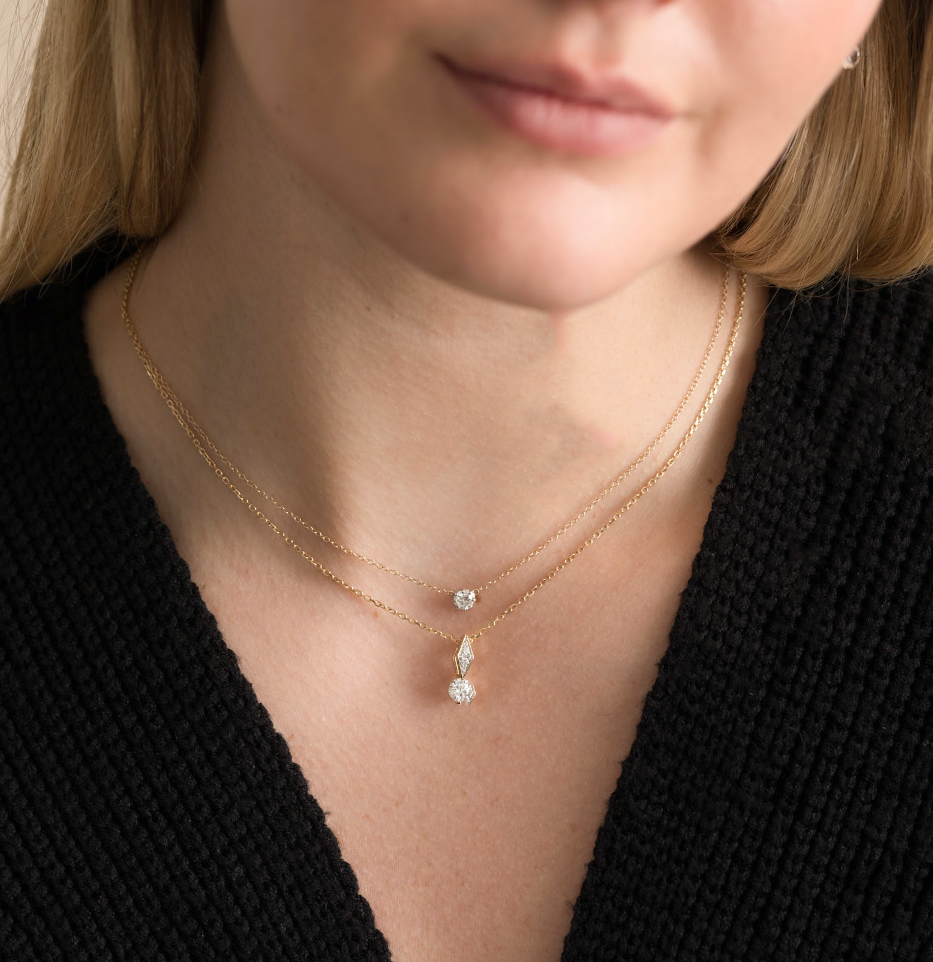 14K solid gold necklace with diamond pendant on woman's neck, elegant and stylish.