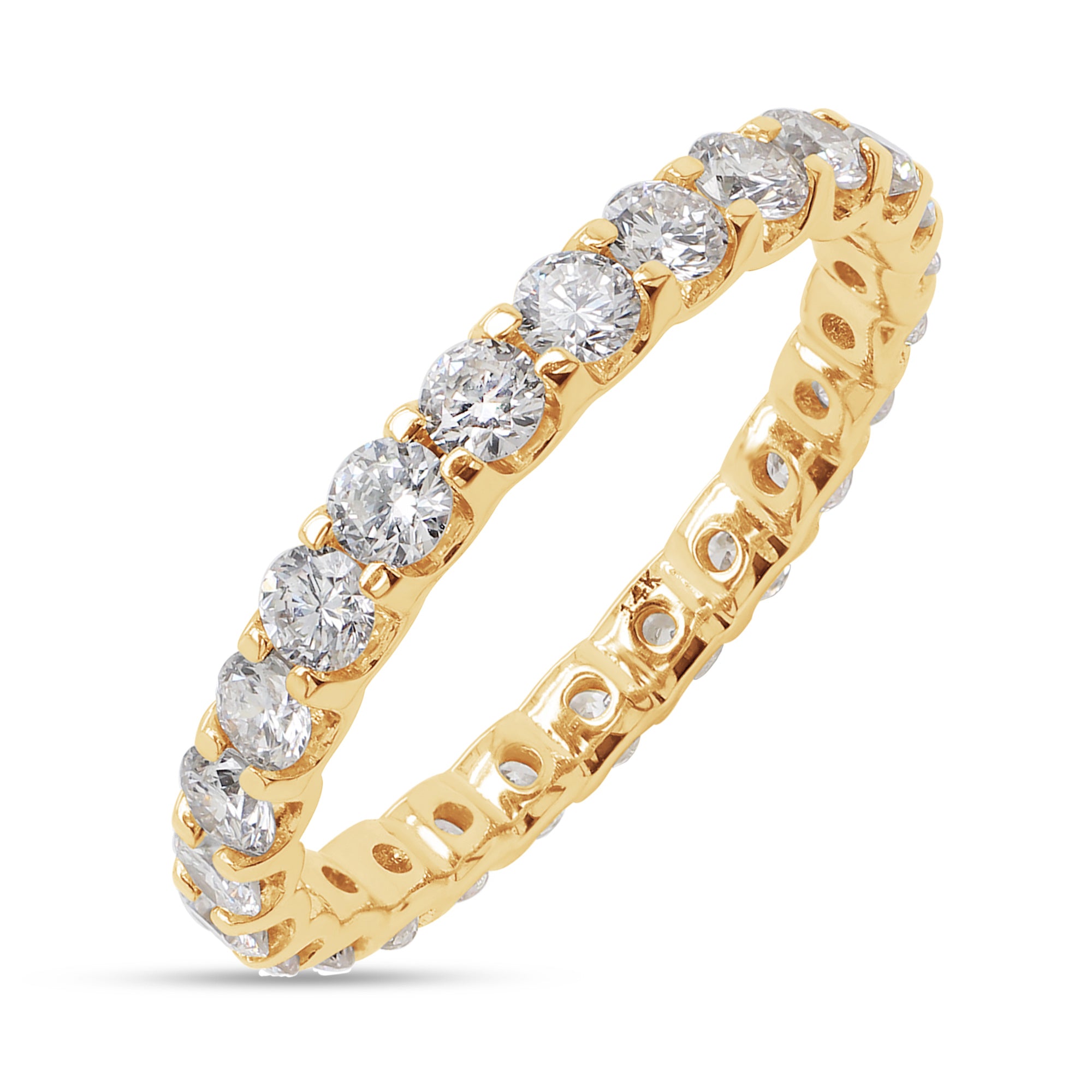 Gold ring with diamonds on a white background