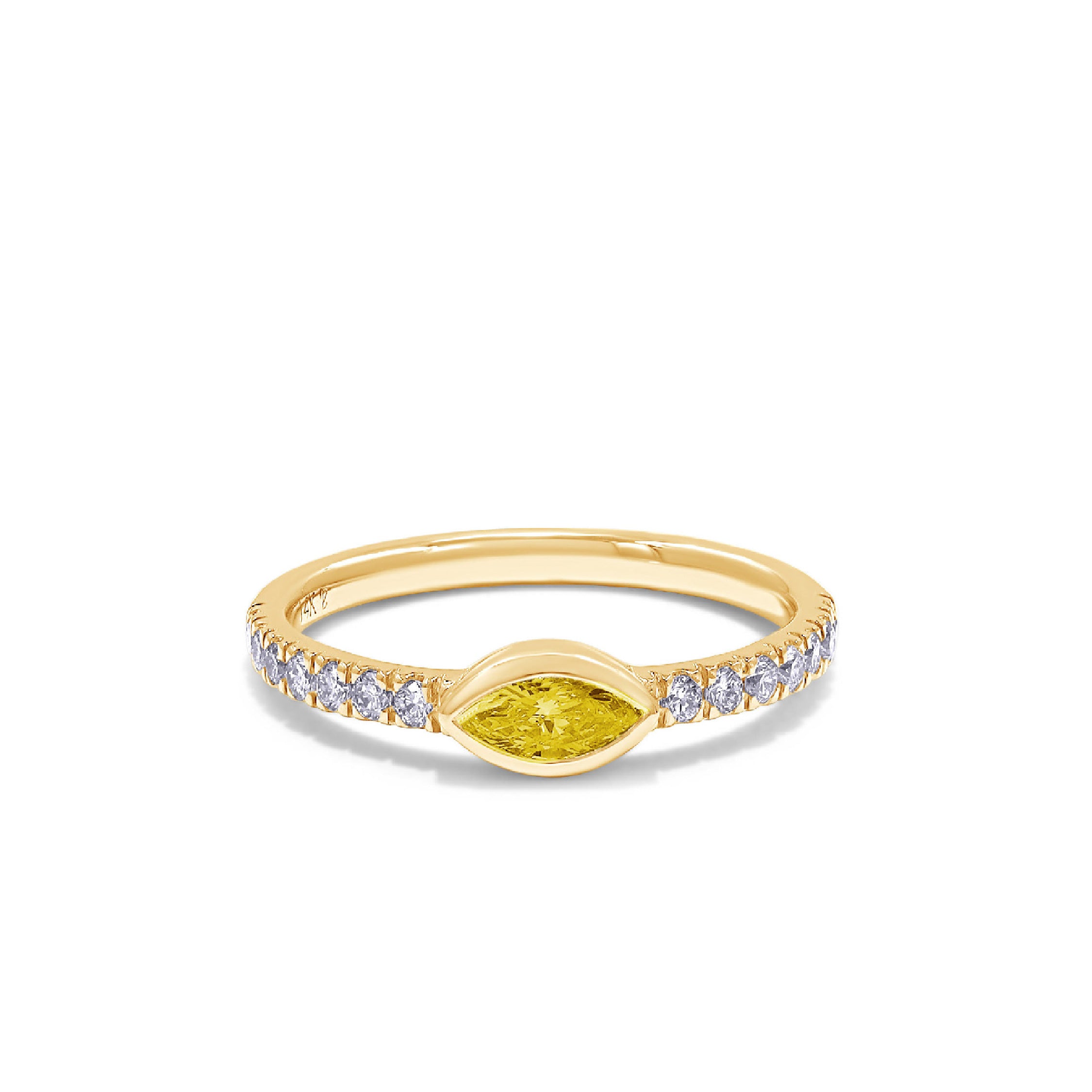 The Sutton 14K solid gold ring with a yellow diamond center and side stones.