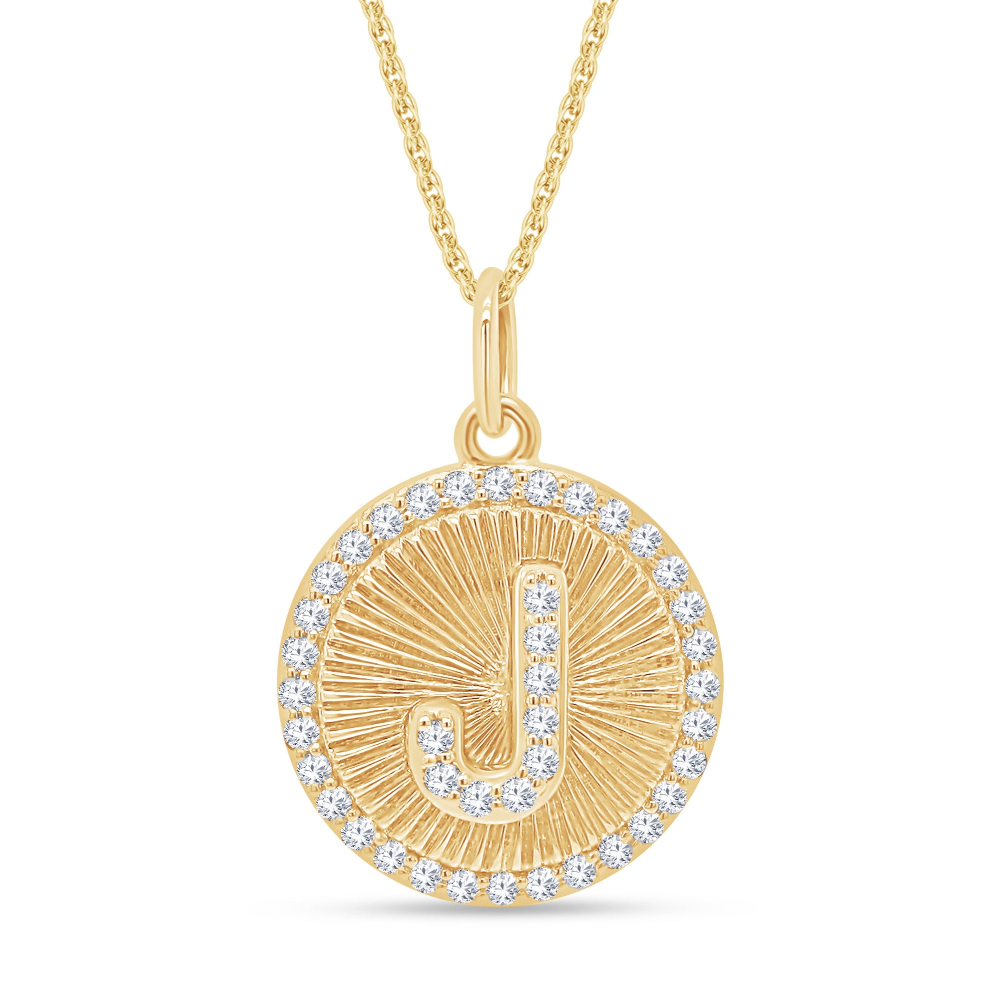 Gold necklace with a circular pendant featuring the letter 'J' and diamonds on a white background
