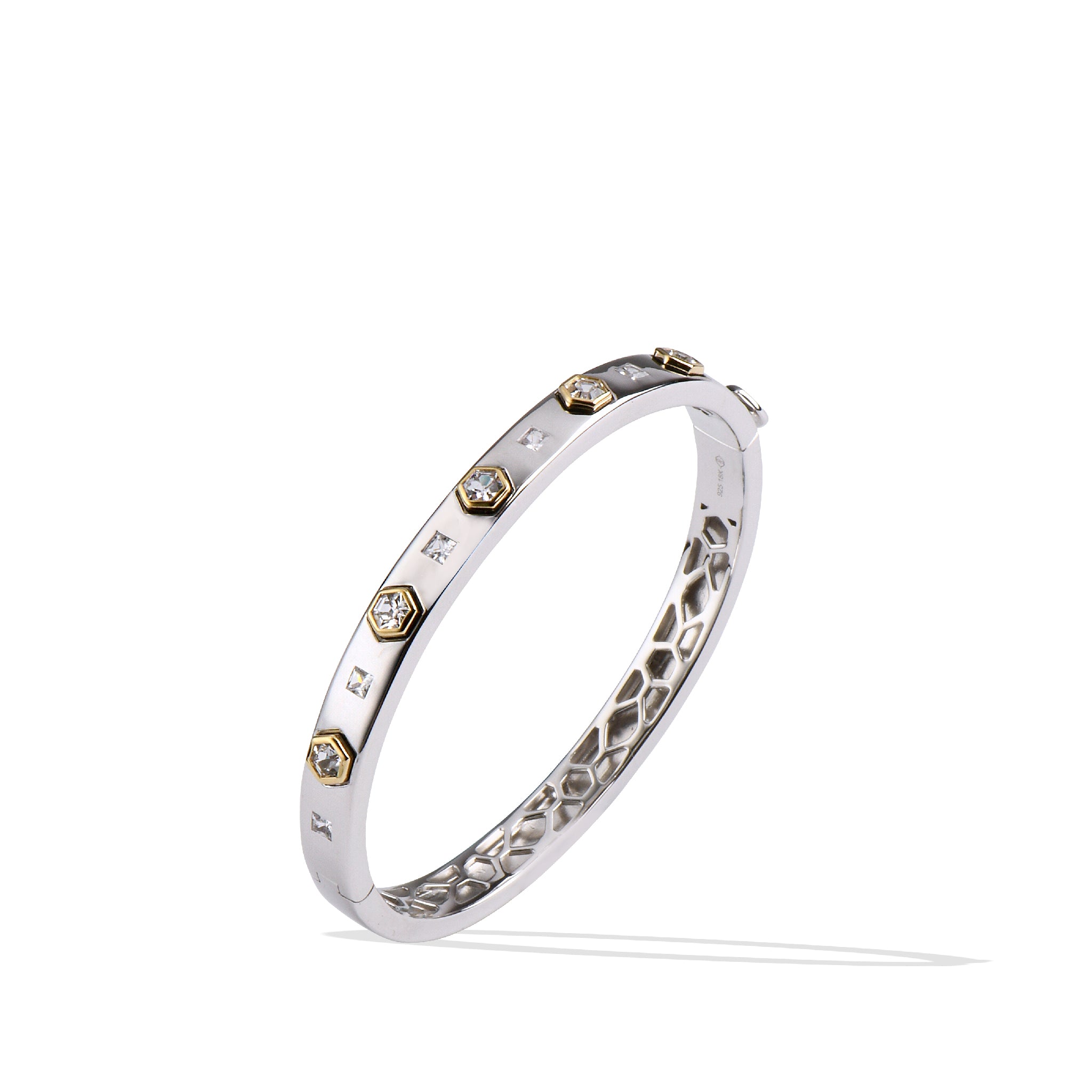 Sterling silver and 14K gold bangle with hexagon and gemstone accents.