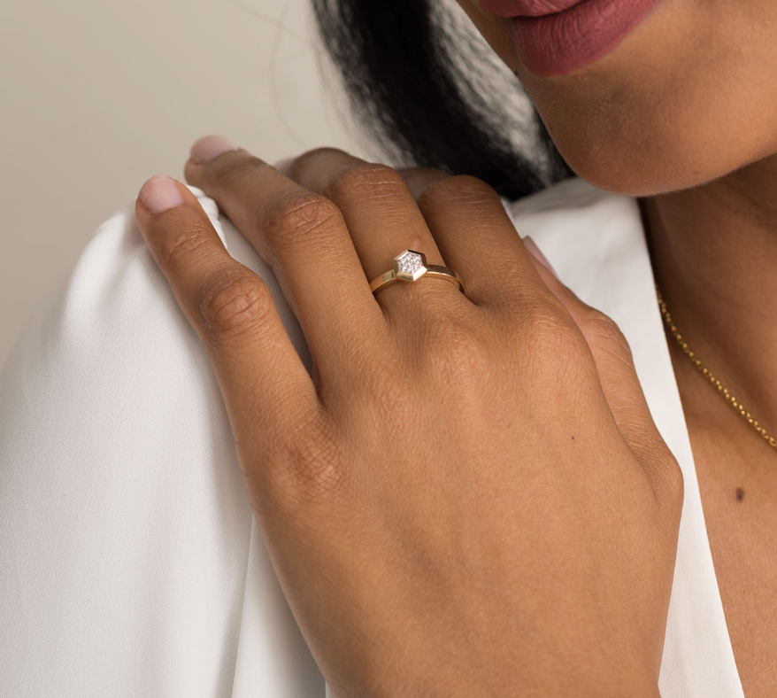 Model wearing a hexagon lab ground diamond ring, perfect for statement or engagement