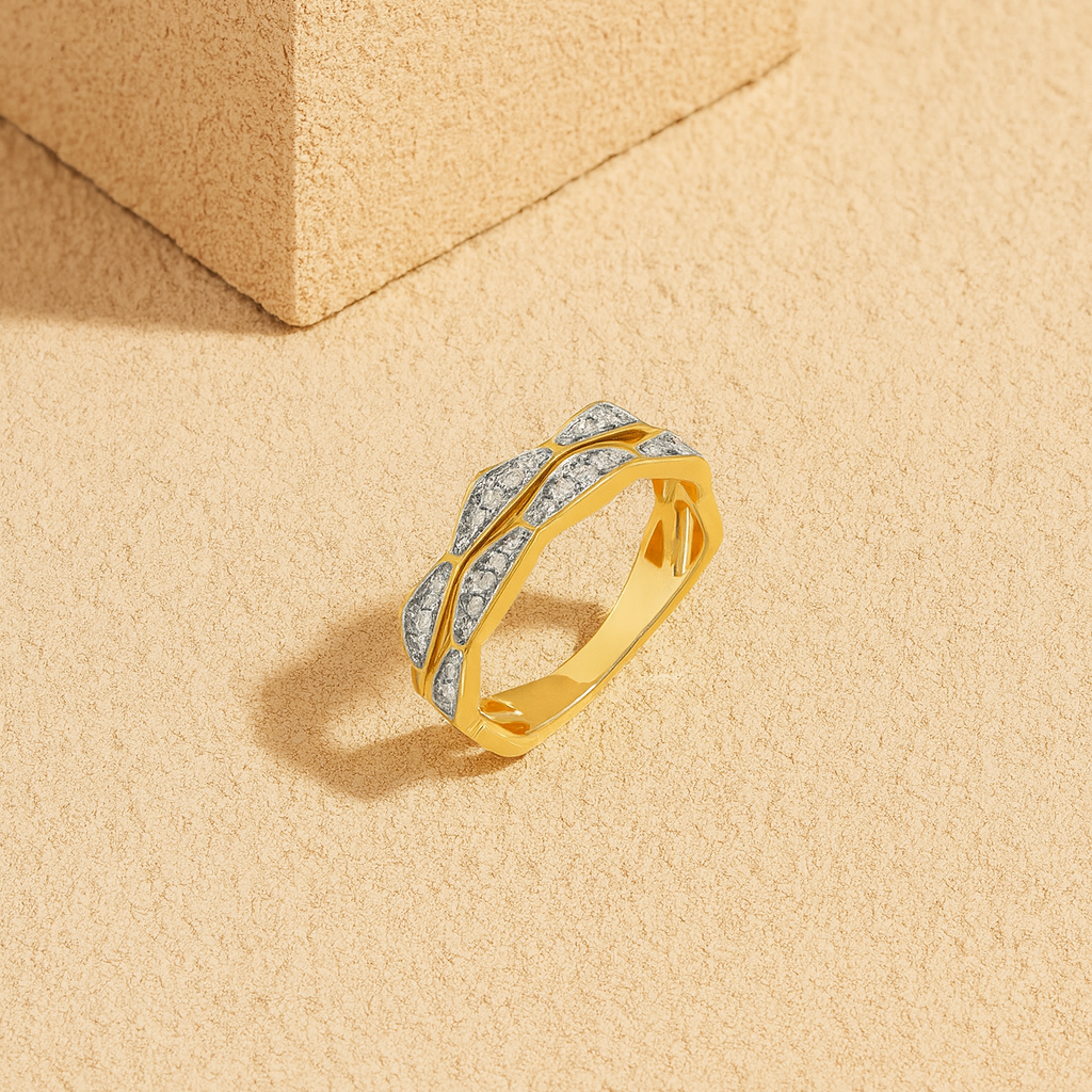 Gold ring with diamonds on a beige background