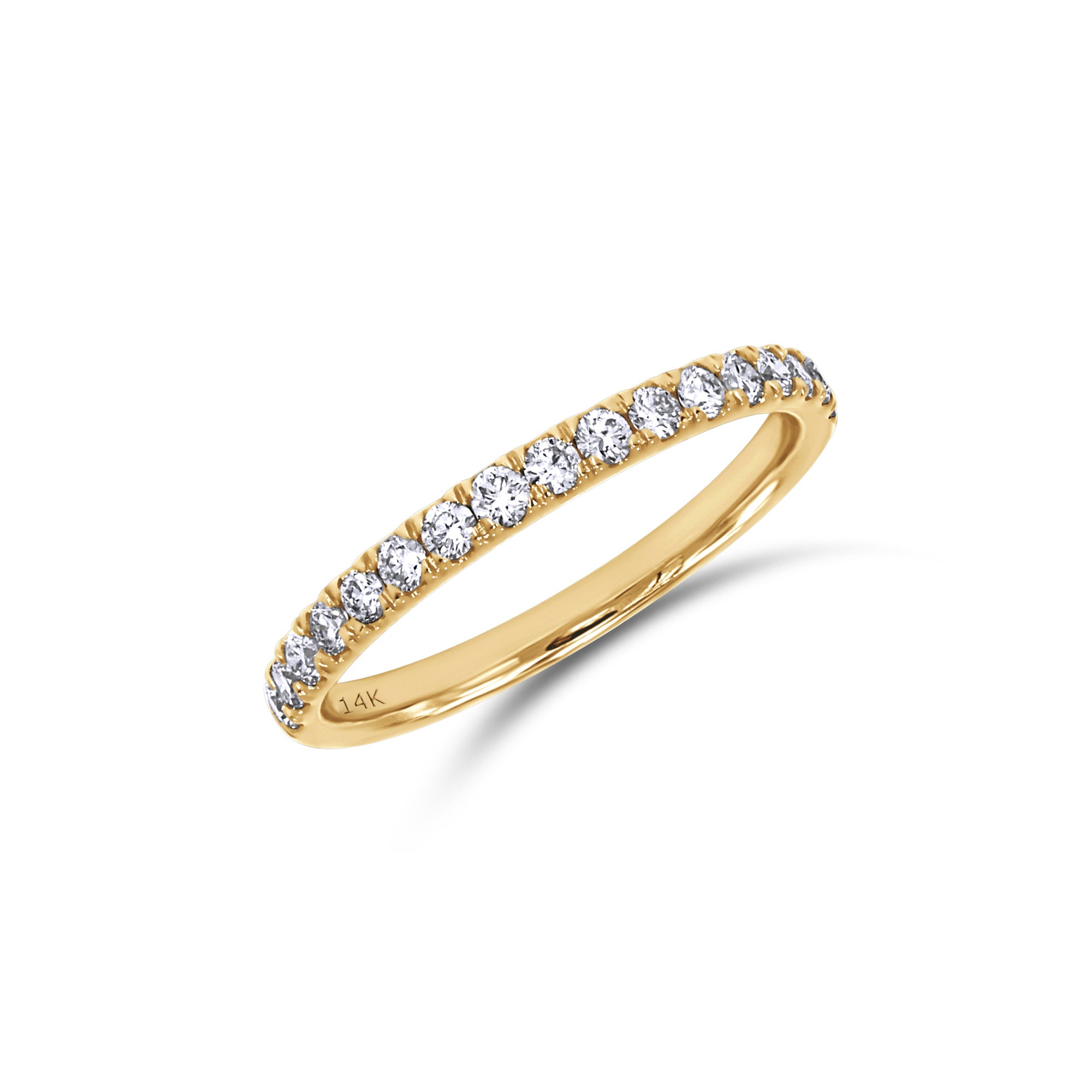 Gold ring with diamonds on a white background
