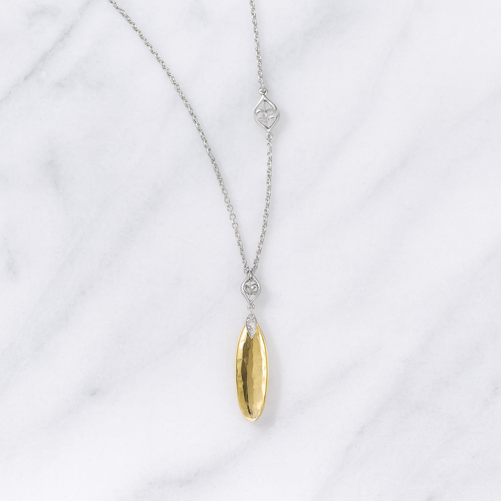 Necklace with a gold pendant on a white background