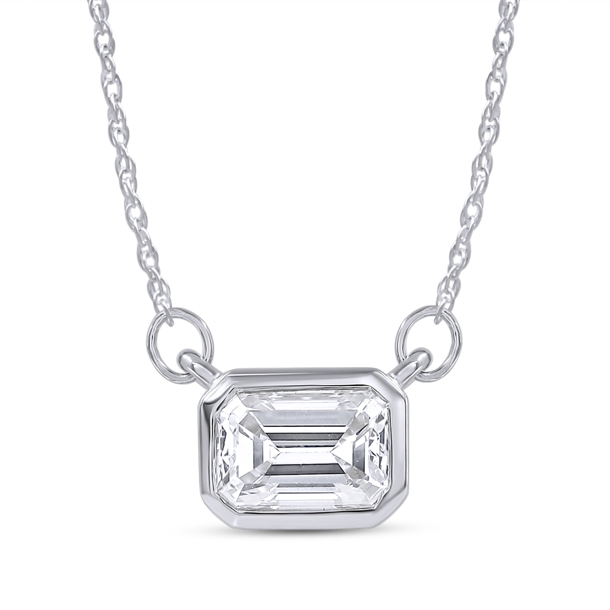 Silver necklace with an emerald-cut diamond pendant on a white background