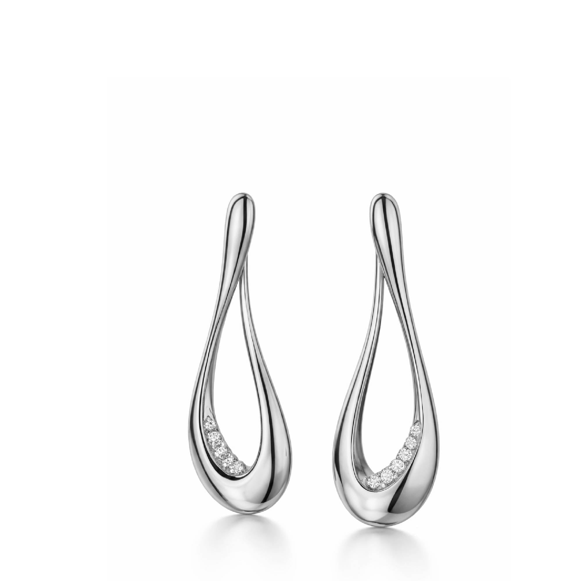 Pair of silver earrings with small diamonds on a white background