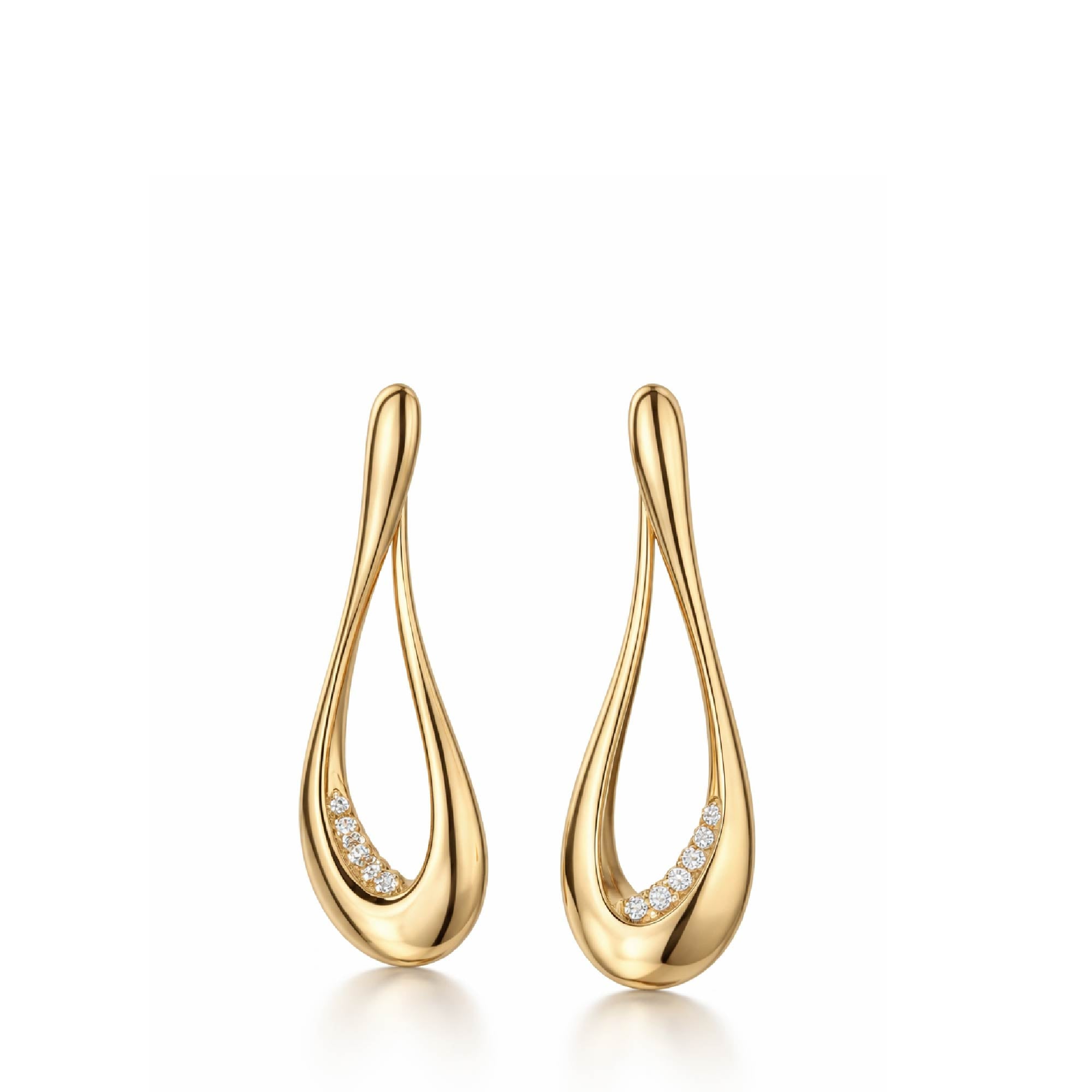 Gold earrings with diamond accents on a white background
