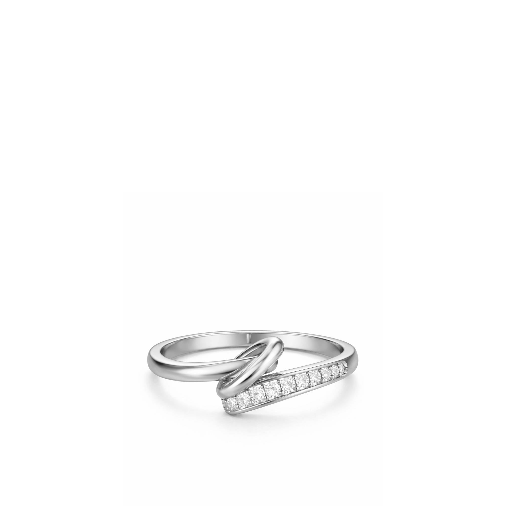 Silver ring with diamond accents on a white background