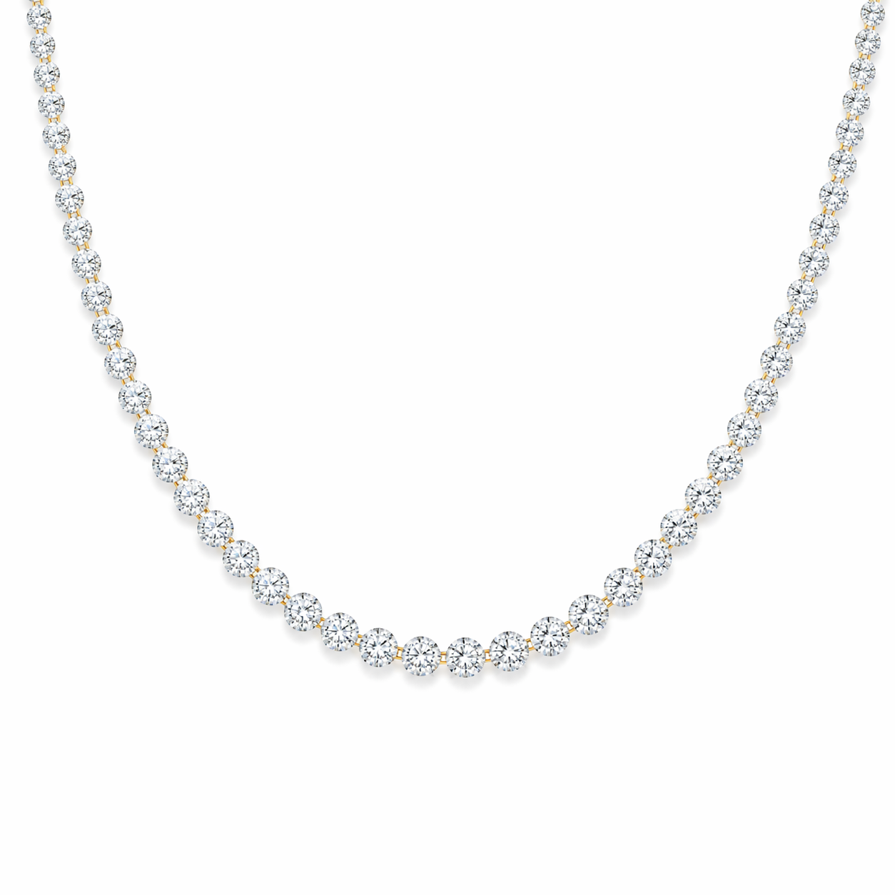 Dainty silver necklace with small round beads on a white background