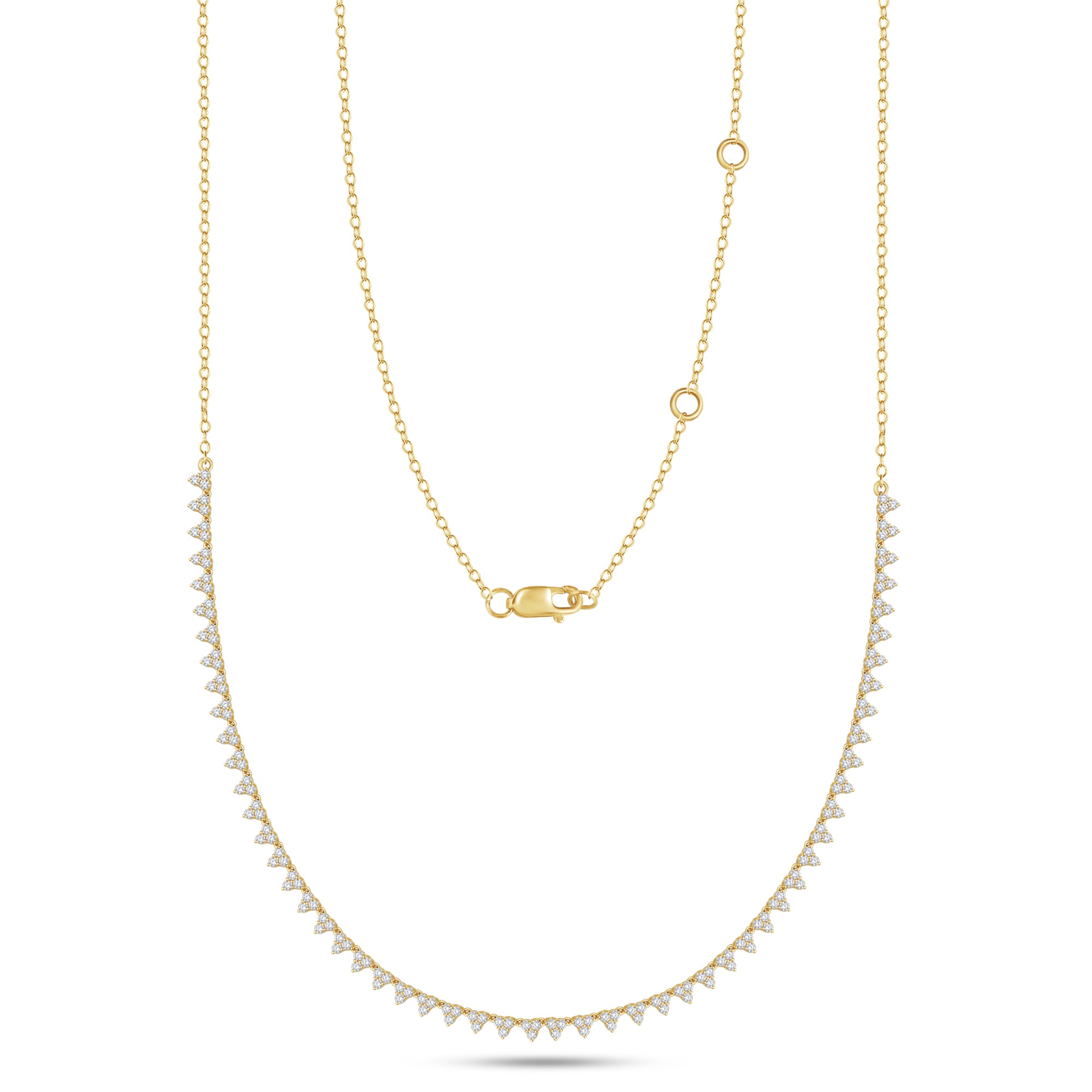 Gold necklace with small pearls on a white background