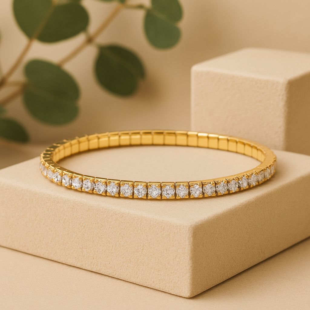 Gold bracelet with diamonds on a beige stand with a blurred green plant background