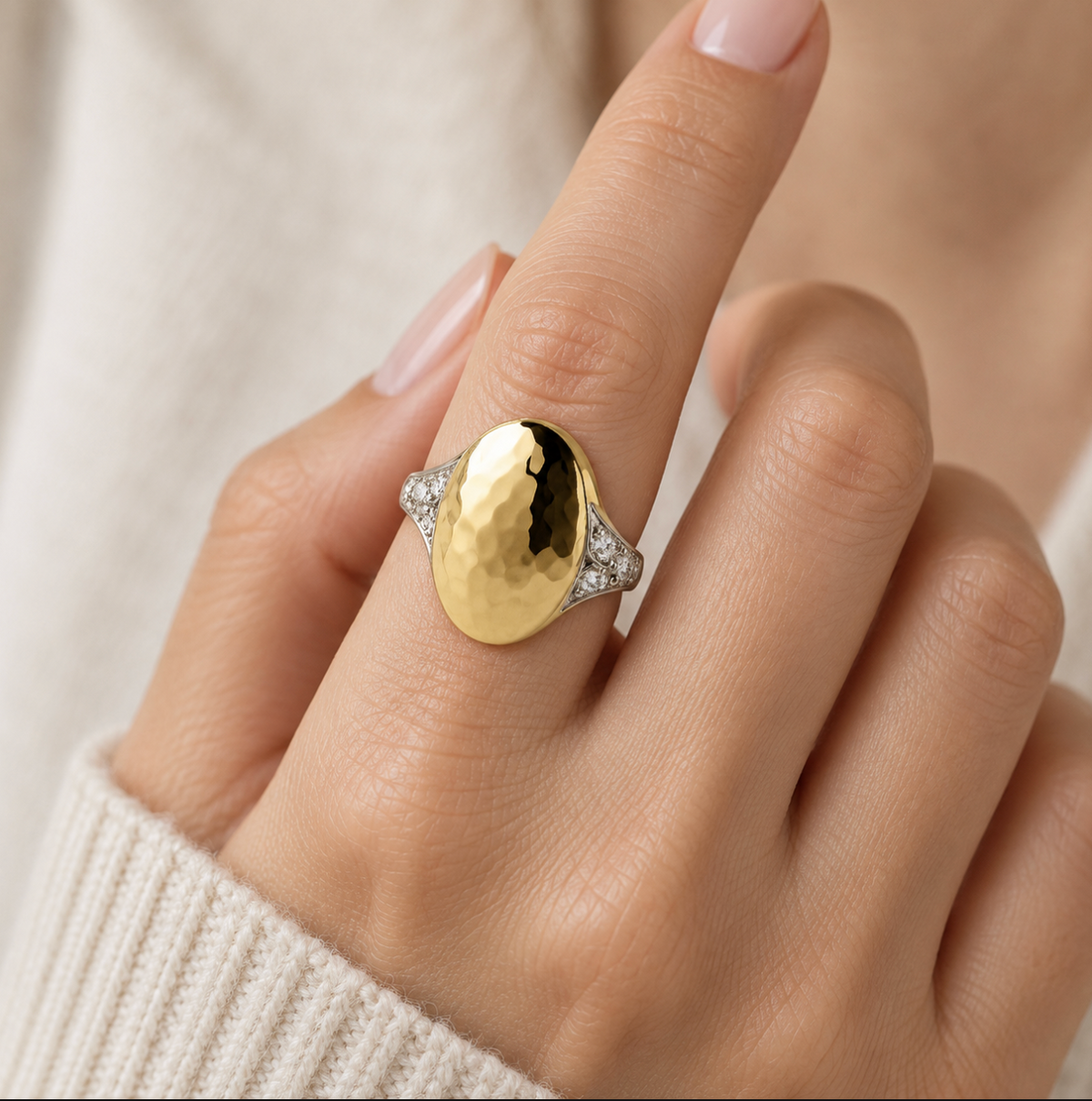 The asher hammered ring on a finger
