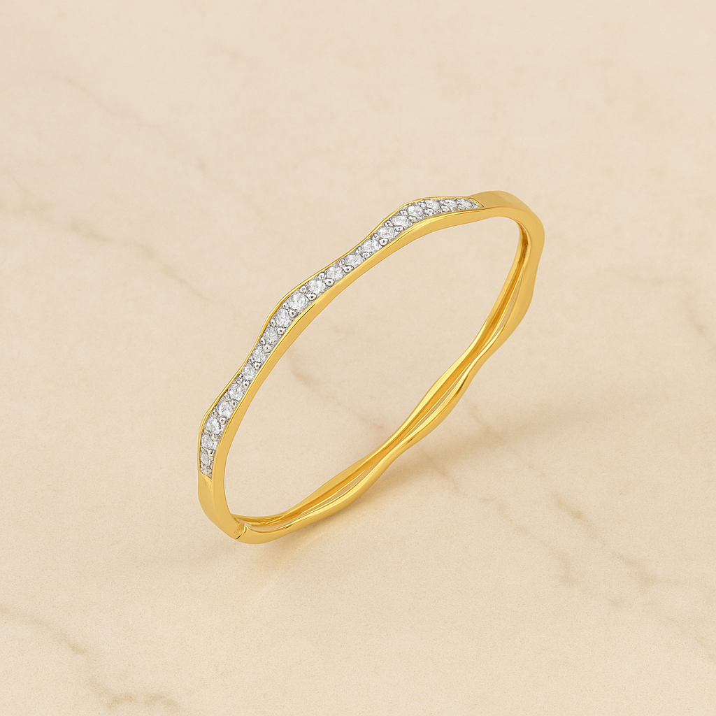 Gold ring with small diamonds on a beige background