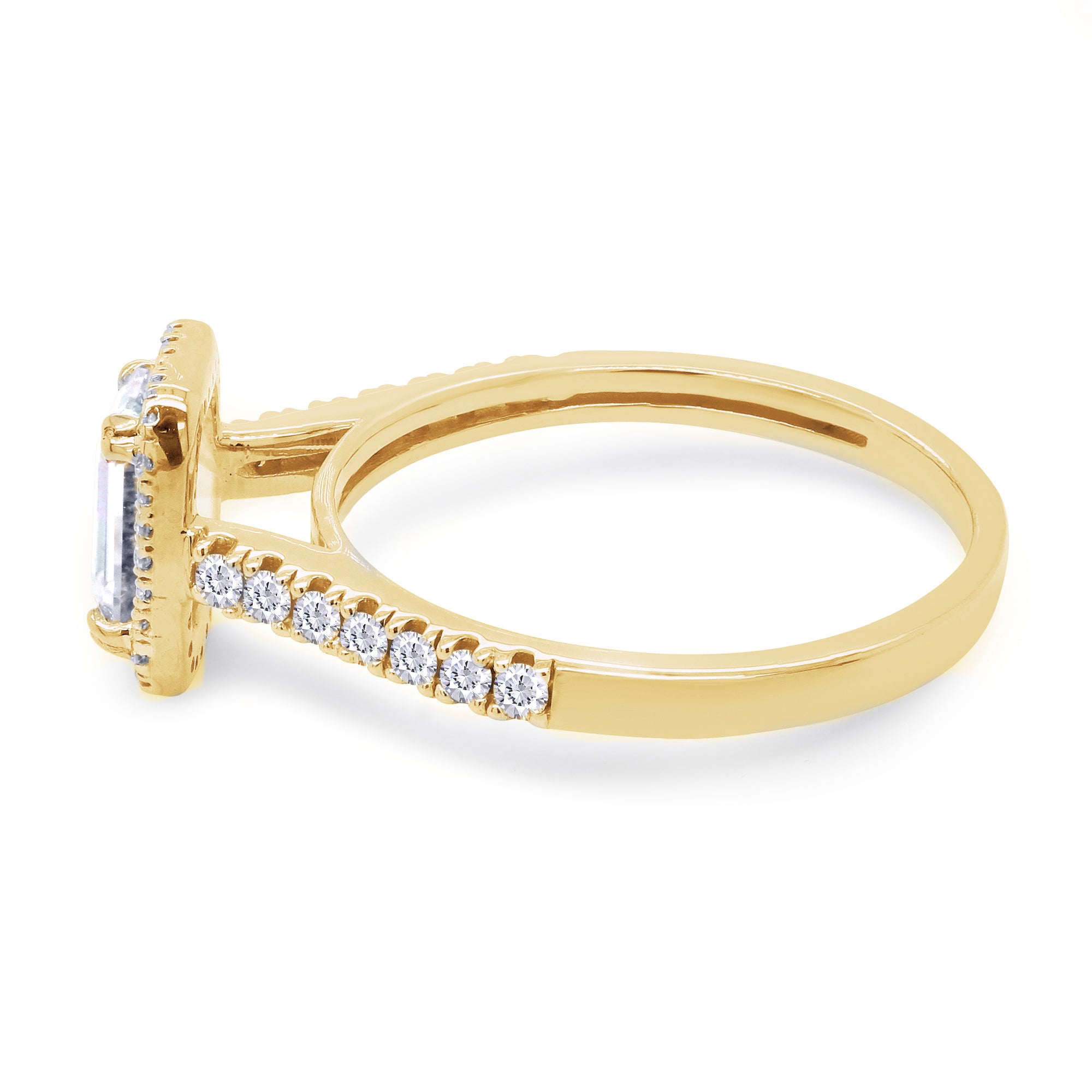 Gold ring with diamond accents on a white background