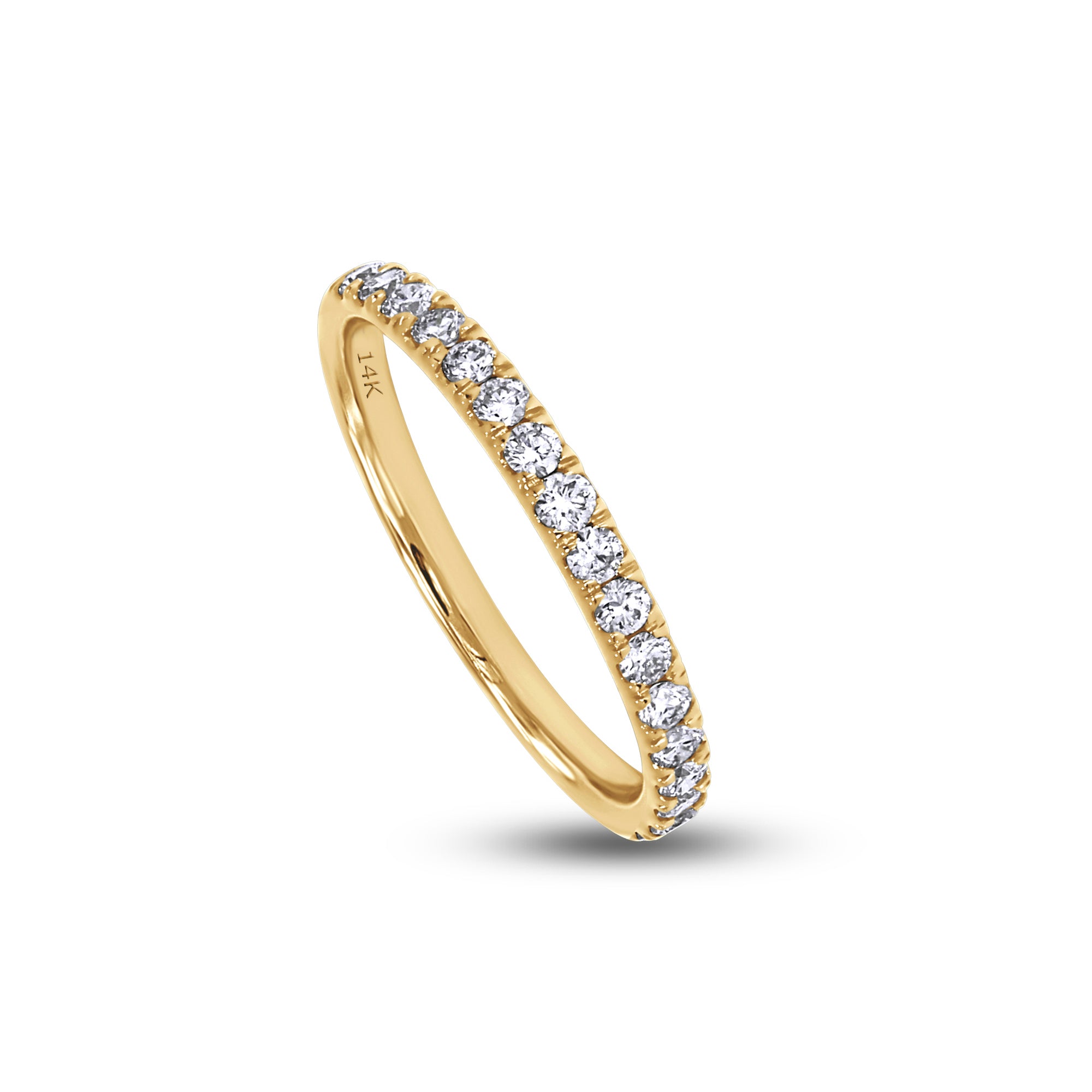 Gold ring with diamonds on a white background