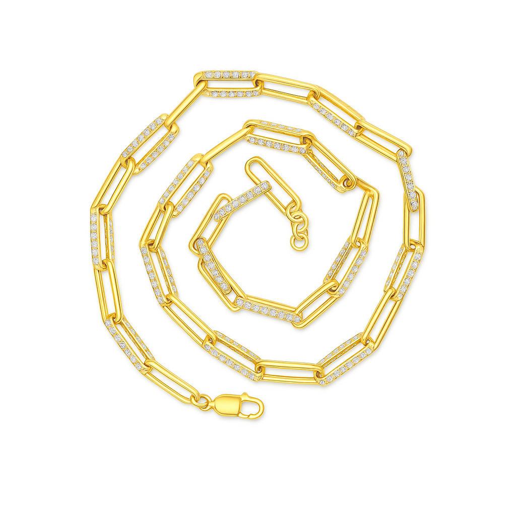 Gold chain necklace with diamond accents on a white background