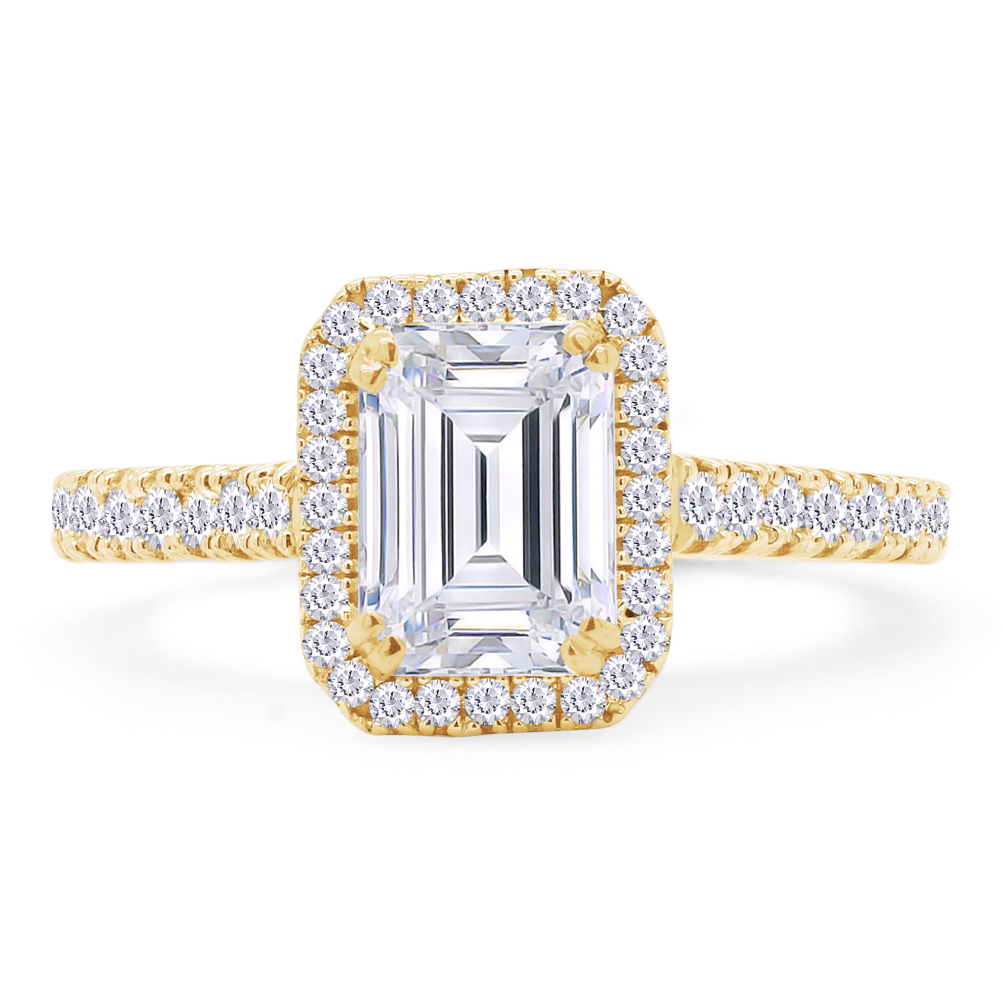 Gold ring with emerald-cut center stone and diamond accents on a white background