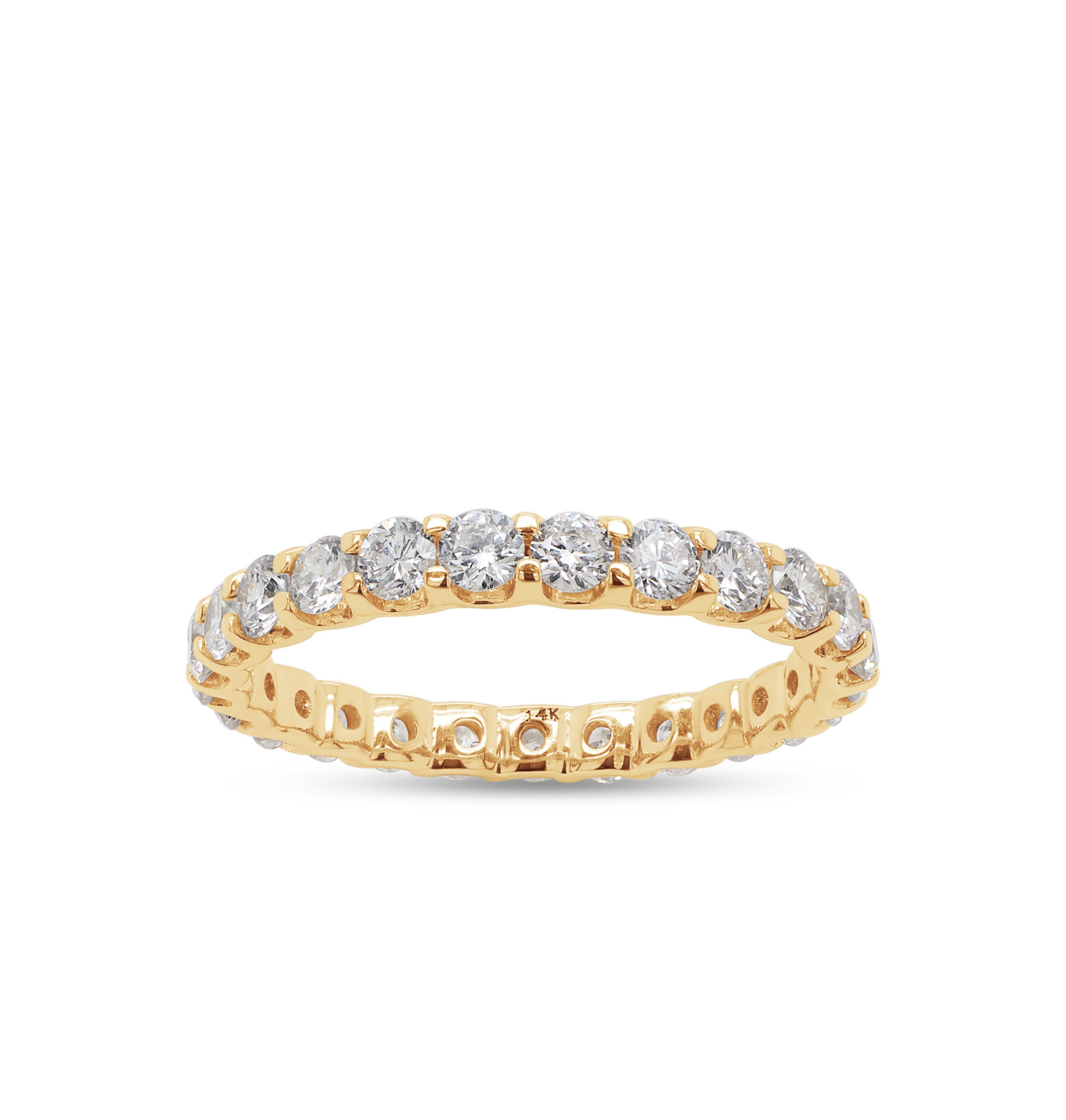 Gold ring with diamonds on a white background