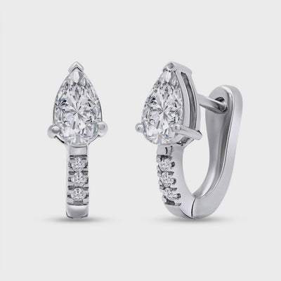 the cyrus earrings with lab grown diamonds on a white background 