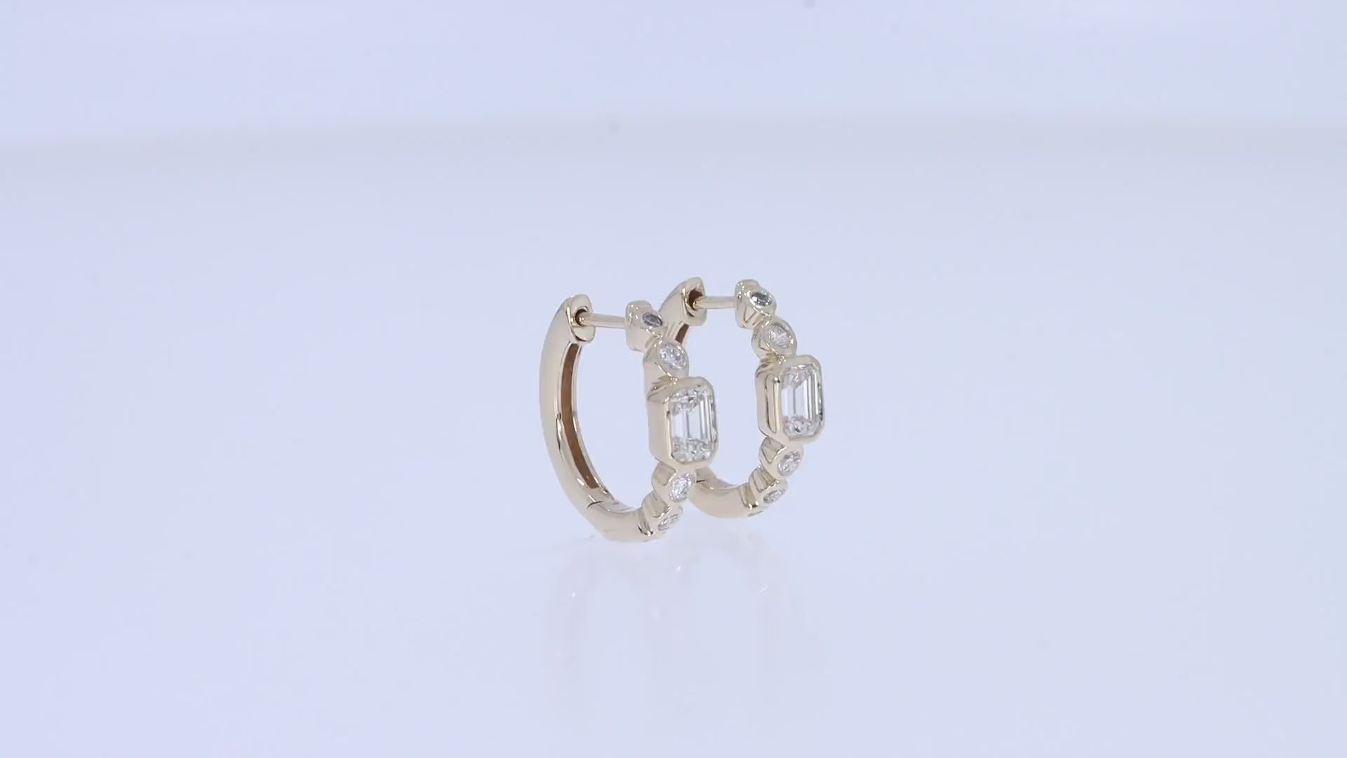 Gold Vermeil Earrings with a Emerald Center and round diamonds video 
