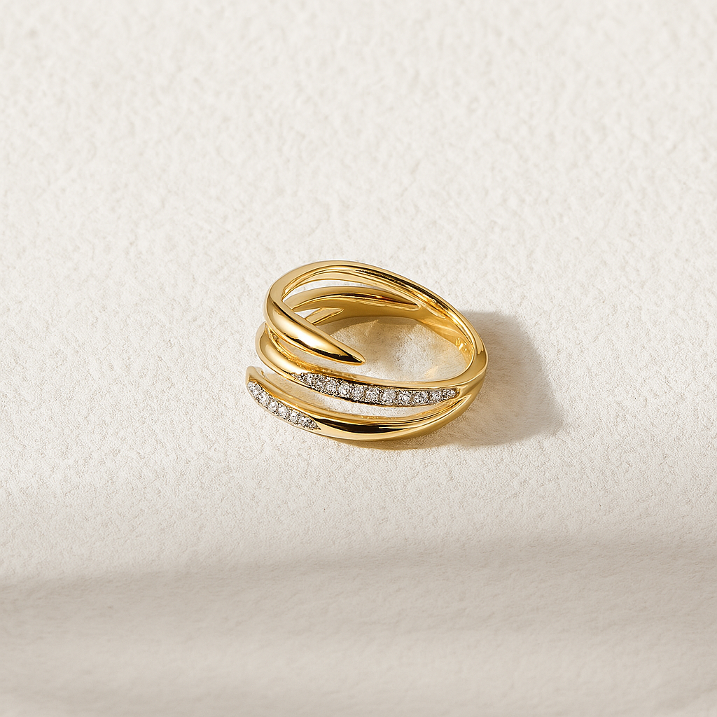 solid gold diamond ring on a beige background