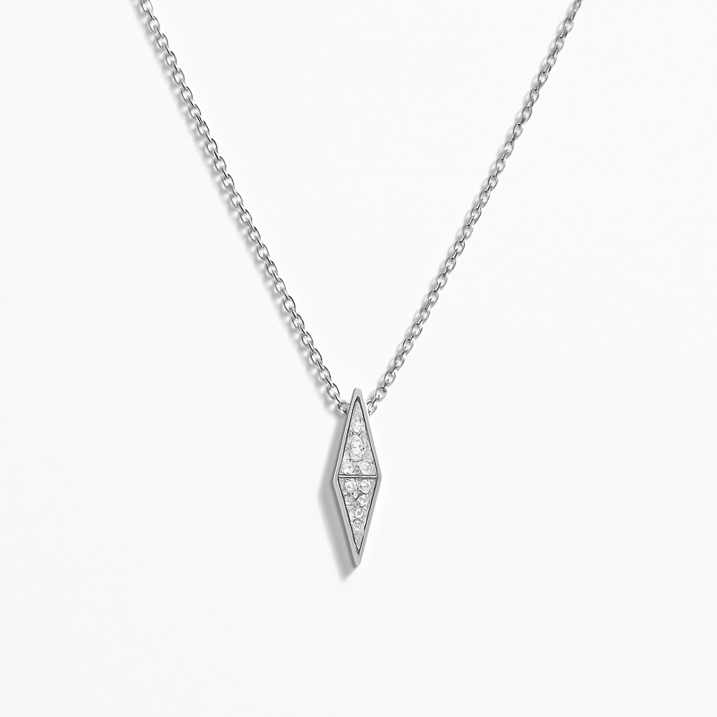 Silver necklace with a geometric pendant on a white background
